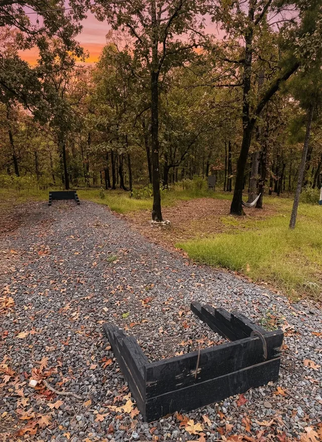 Horseshoe pits and hammock among the trees at The Aroha