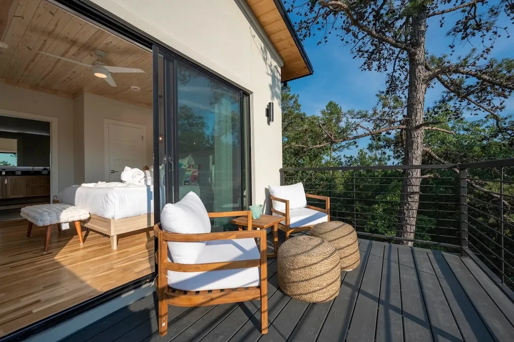 King Suite 1 opening onto its private forest-view deck