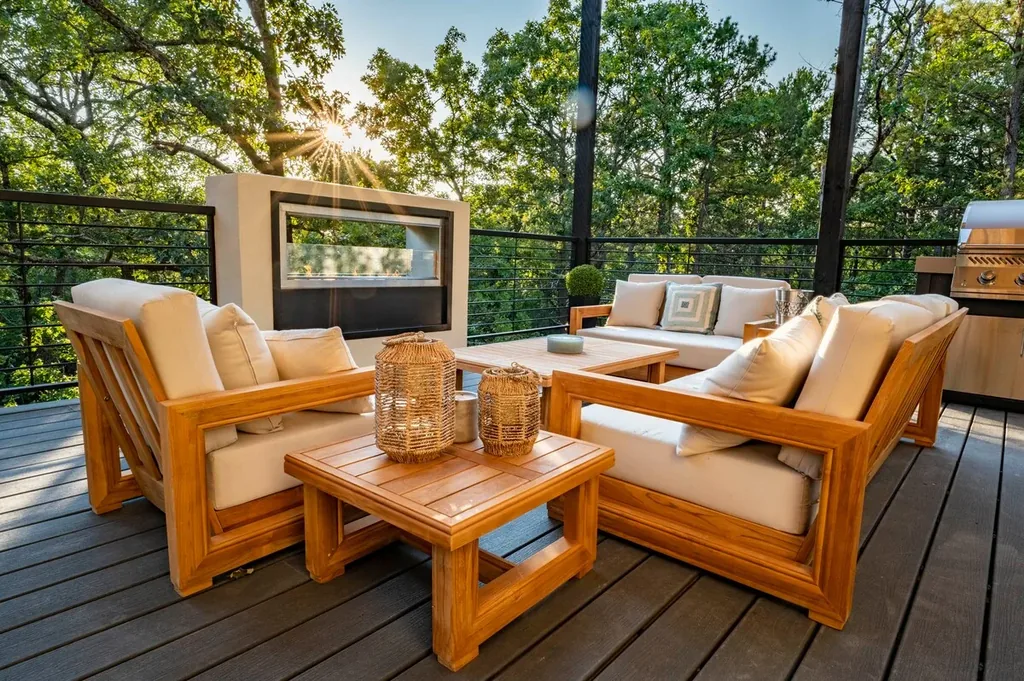 Outdoor lounge around the see-through fireplace at The Aroha
