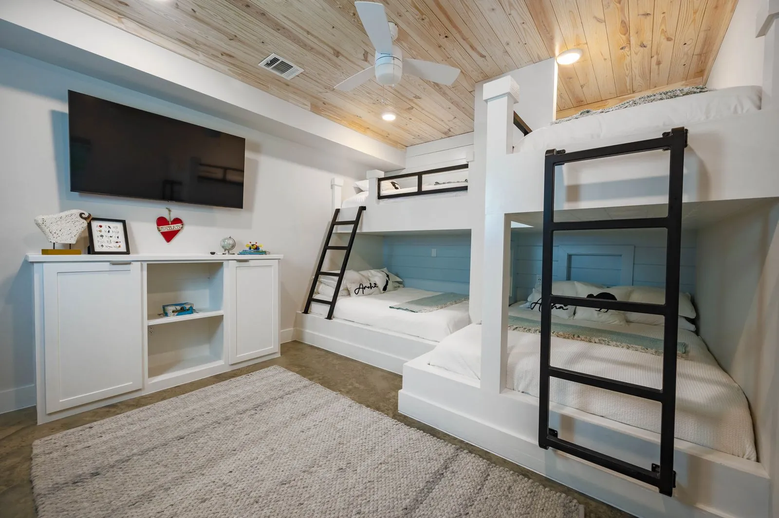 Bunk room at The Aroha with built-in queen and single bunks