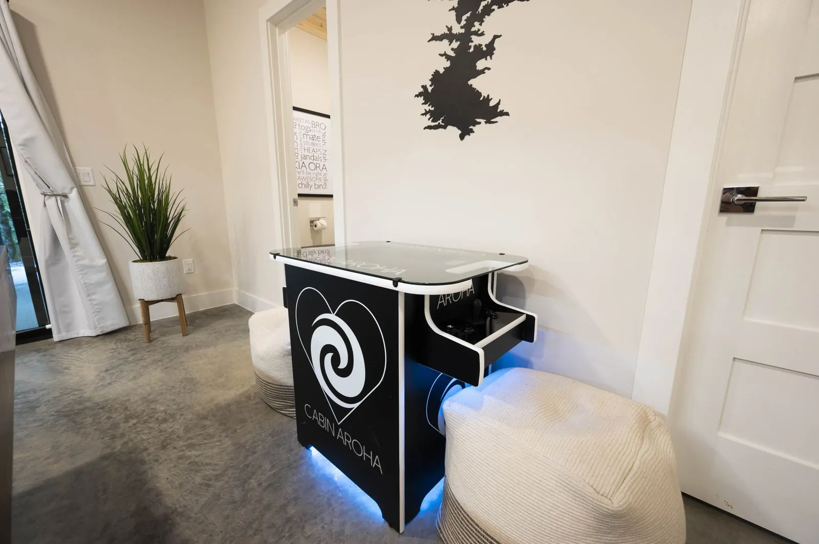 Arcade machine in the game room at The Aroha