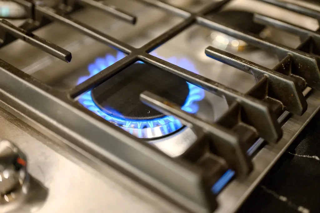 Blue flame on the kitchen's gas cooktop