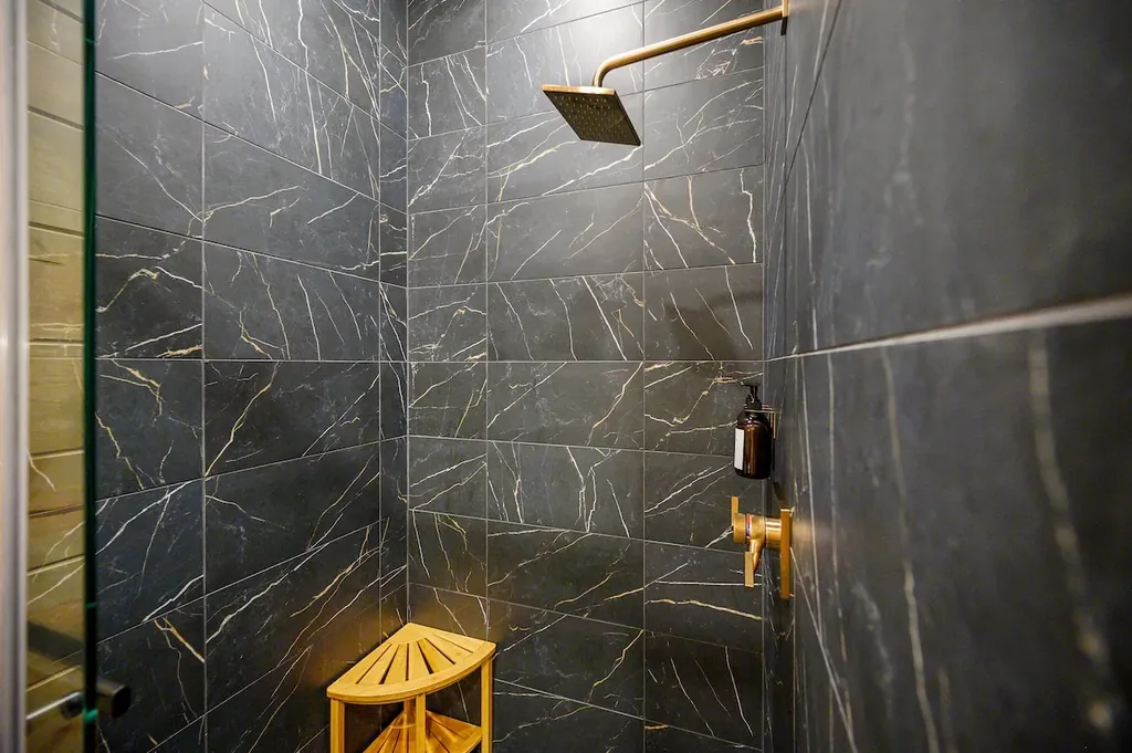 Full Bathroom 3 dark marble walk-in shower