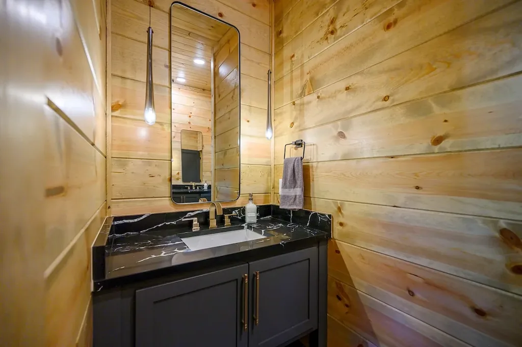Full Bathroom 3 vanity with black marble countertop