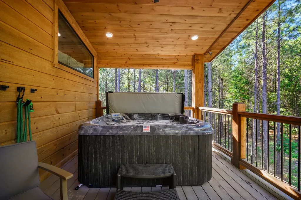 Private hot tub beneath the covered deck