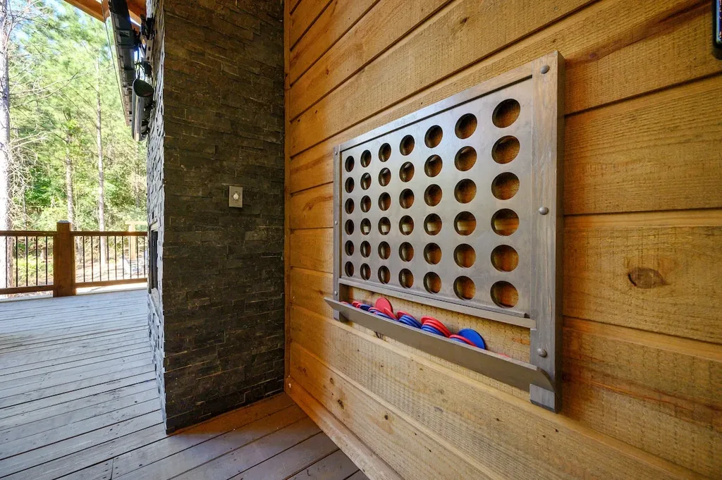 Giant Connect Four game beside the outdoor living area