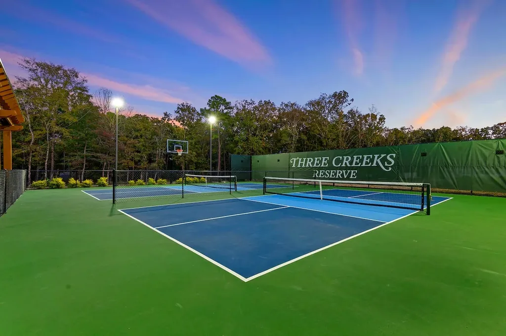 The Black-Beary — Play pickleball or shoot hoops under the lights at the shared Three Creeks Reserve courts, included at no extra cost.