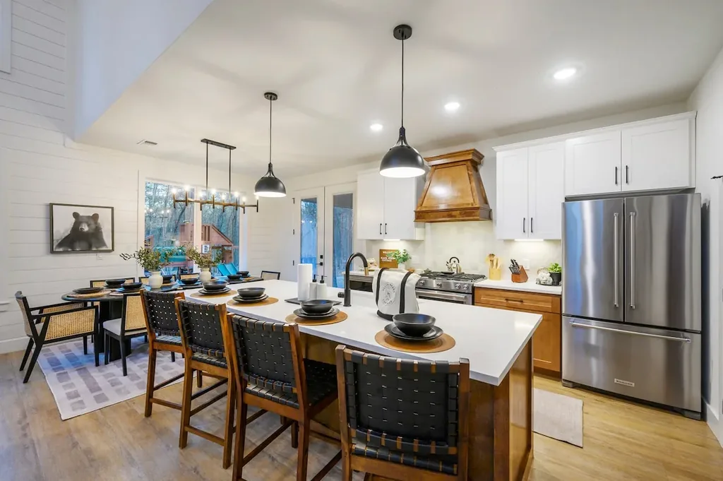 The Black-Beary — Cook and gather together at the oversized island, with plenty of seating for the whole group plus a separate dining table nearby.