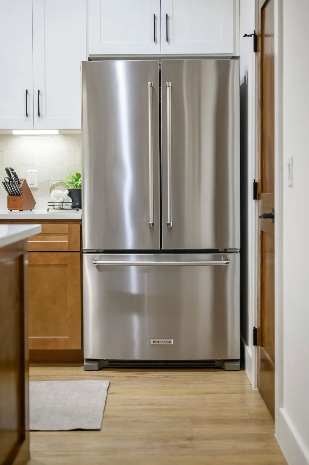 The Black-Beary — Cook and store groceries with ease using the full-size stainless KitchenAid French door refrigerator.