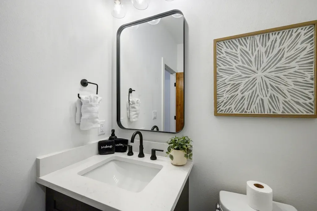 Double vanity and walk-in shower in full bathroom 2