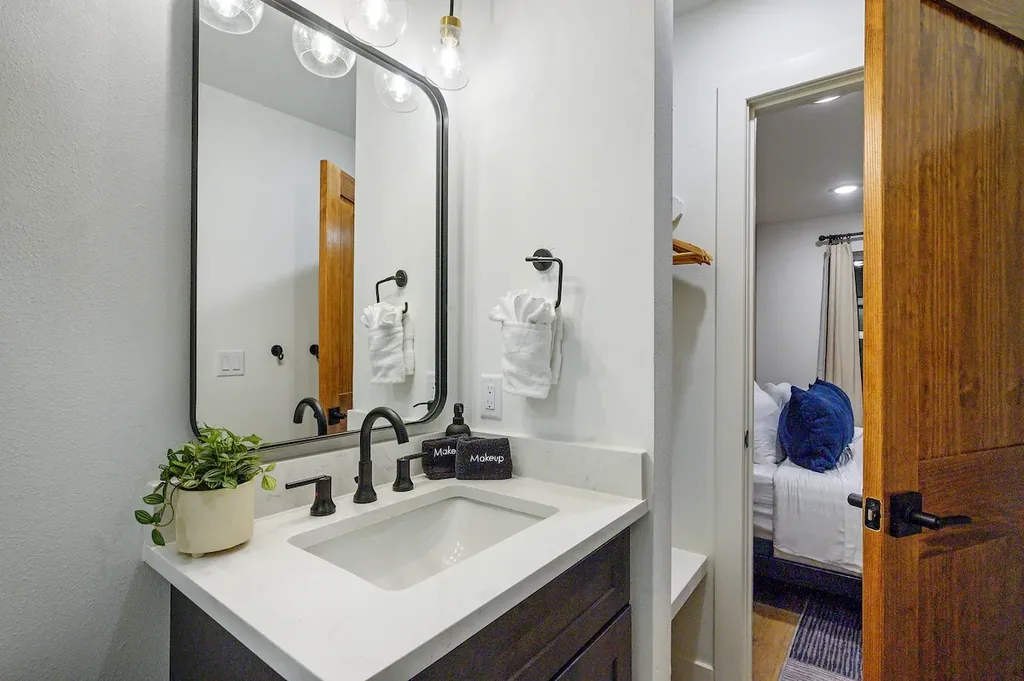 Double vanity and walk-in shower in full bathroom 4