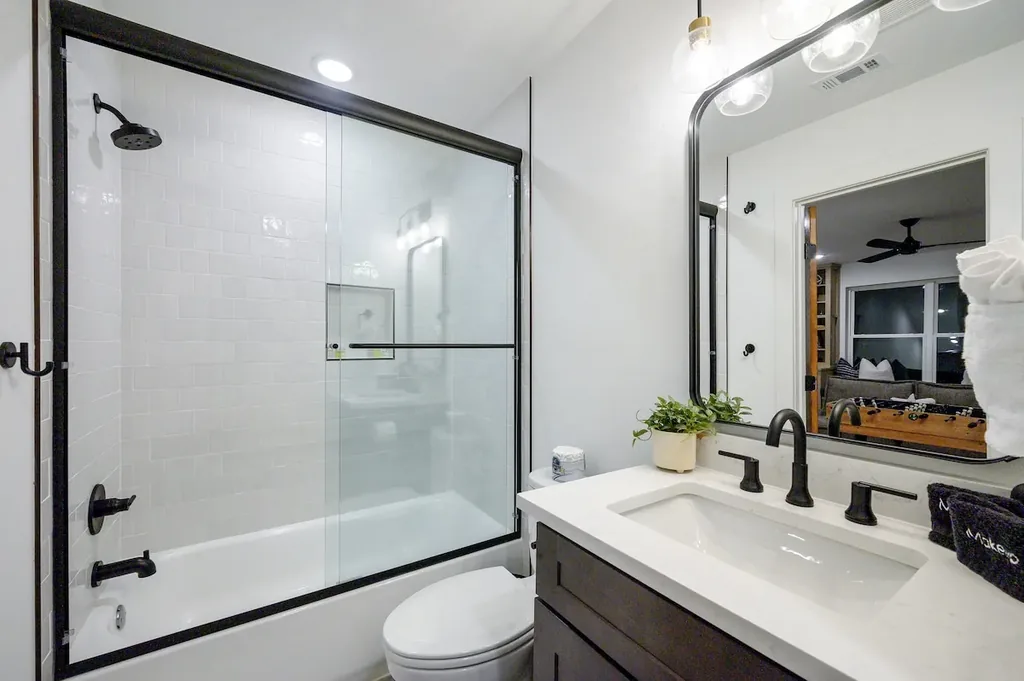Walk-in shower in full bathroom 4