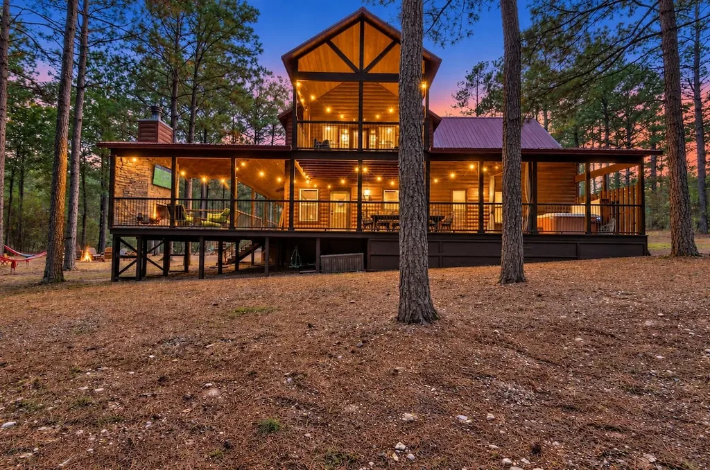 Rear exterior and wraparound deck at Cami's Campout