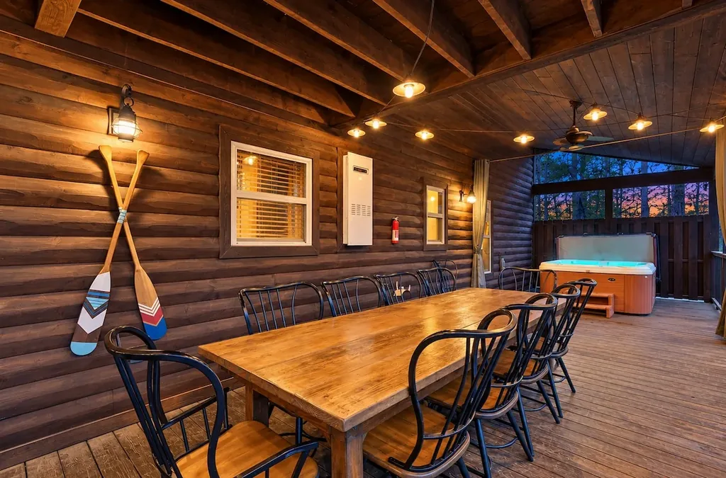 Covered deck dining and recreation area at Cami's Campout