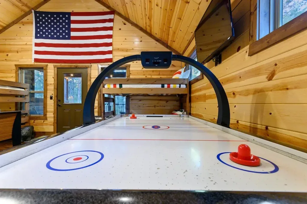 Air hockey table in the Cami's Campout game loft