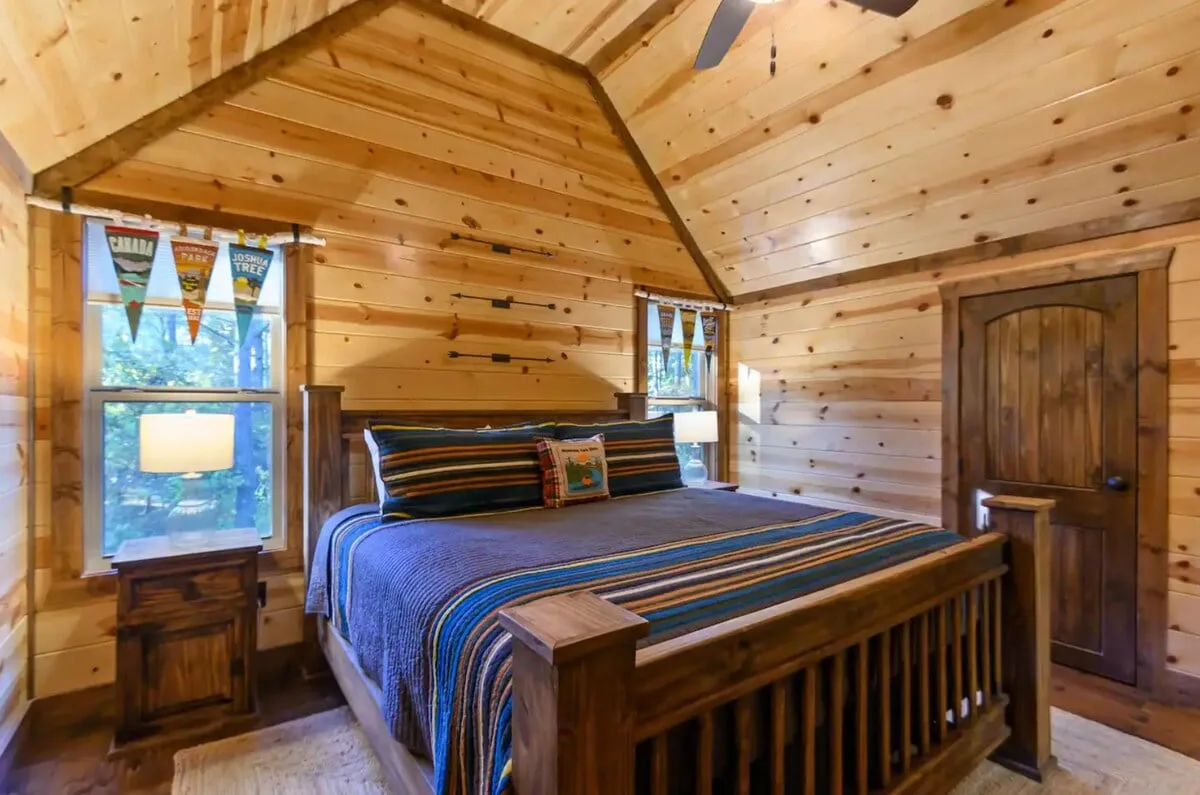 Upstairs king bedroom with twin bunk at Cami's Campout