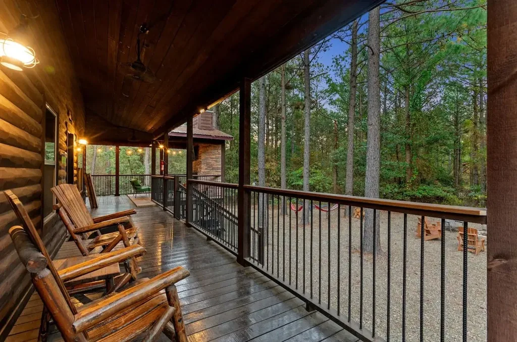 Rocking chairs on the wraparound deck at Cami's Campout