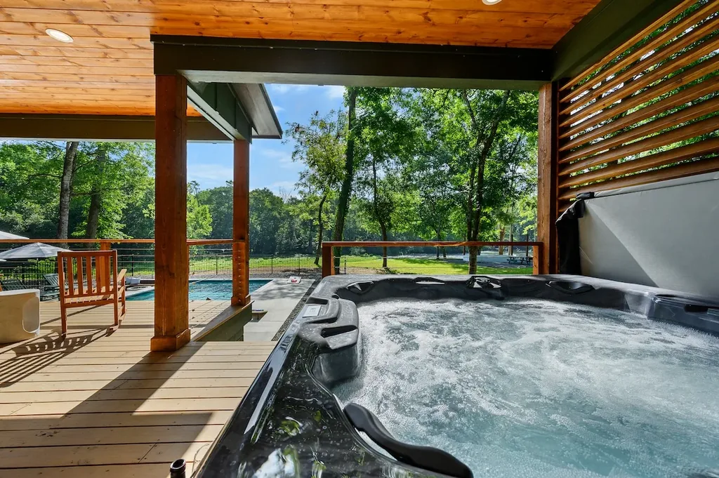 Private hot tub overlooking the Mountain Fork River at Clearwater