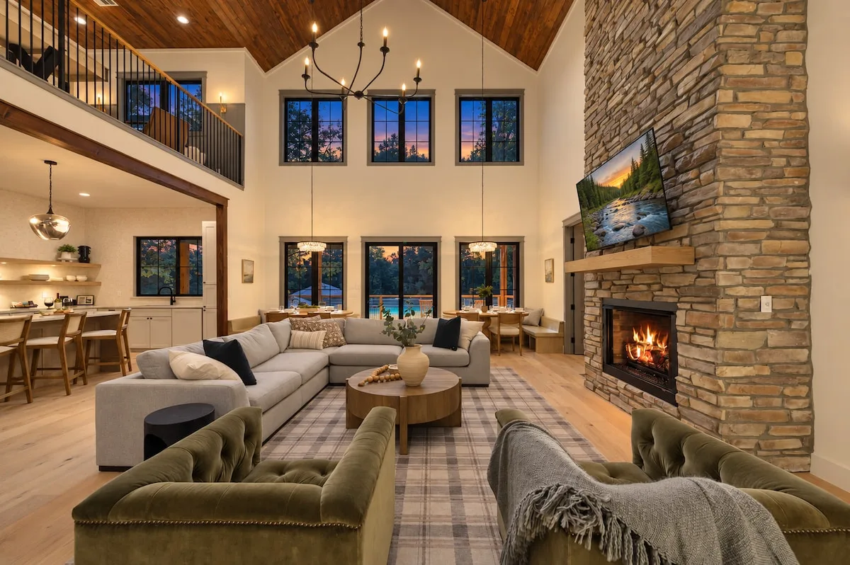 Clearwater living room with fireplace and tall windows
