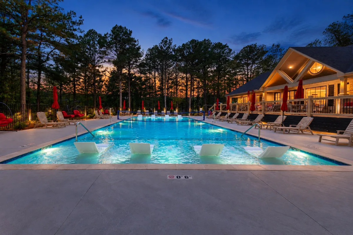 Three Creeks Reserve pool and clubhouse among the pines