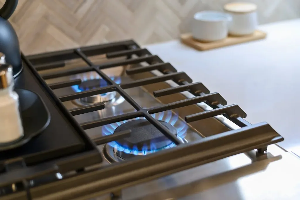Kitchen gas cooktop at DOLCE FAR NIENT in Broken Bow