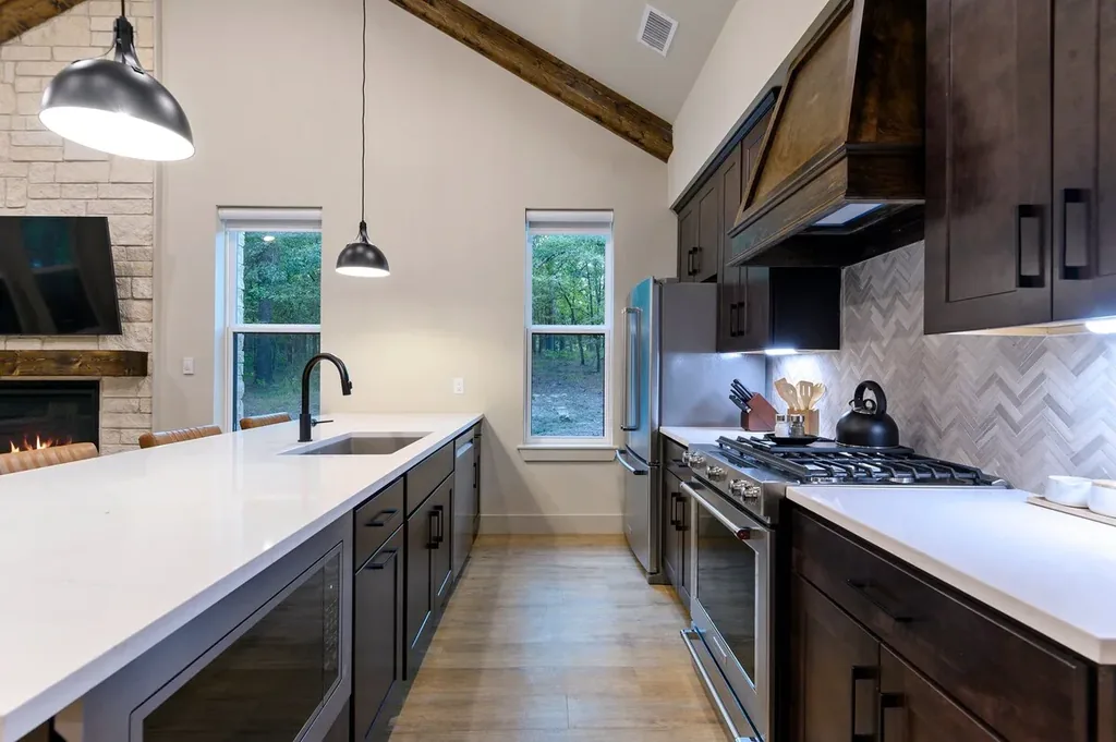 Kitchen range island at DOLCE FAR NIENT in Broken Bow