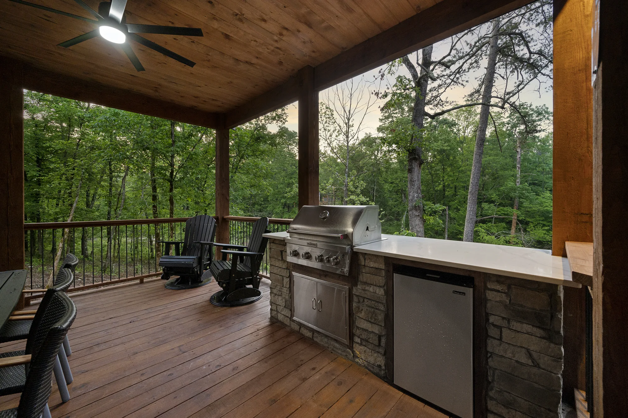 Bedroom with king bed and forest views at Dreams & Streams