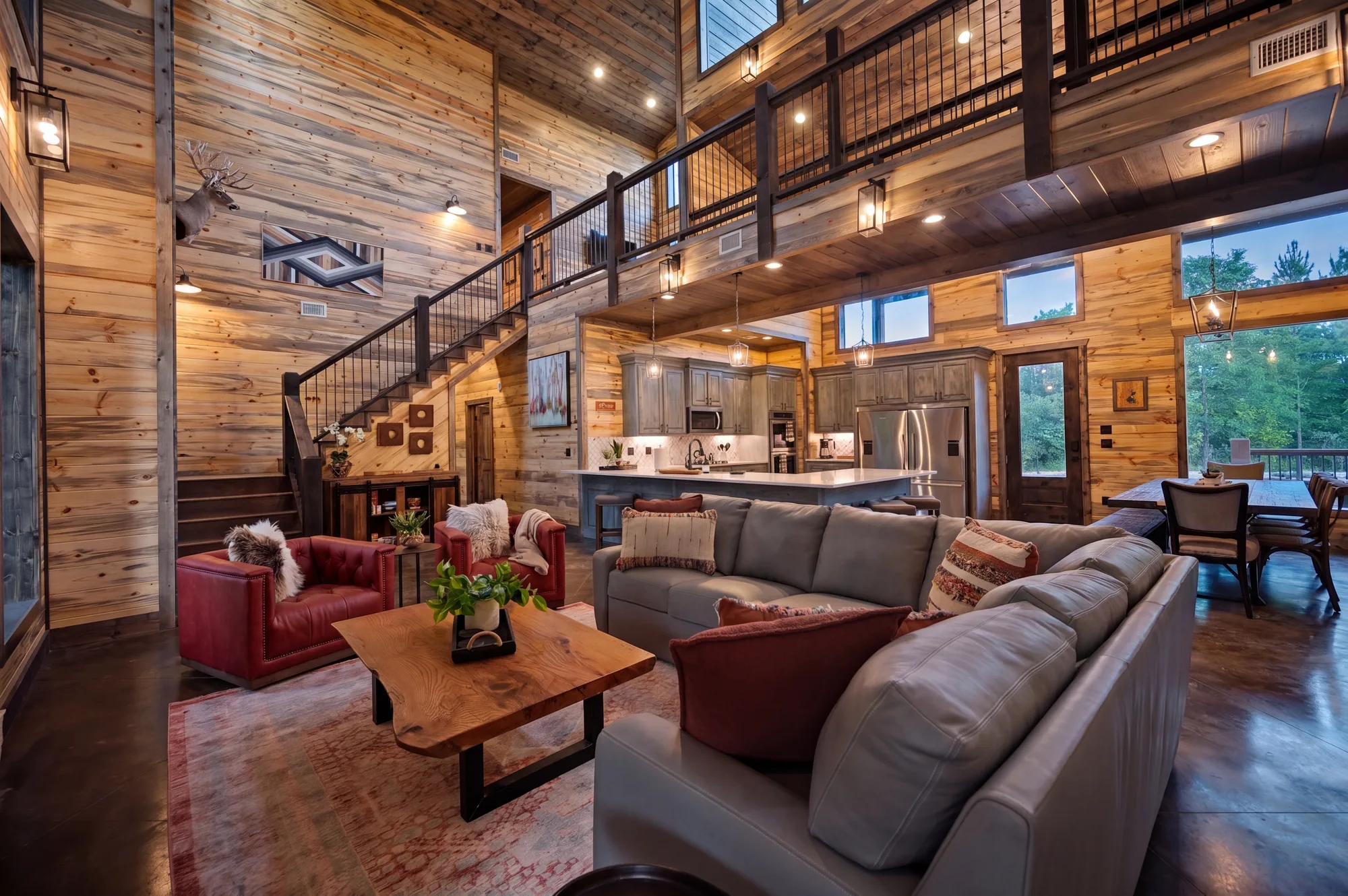 Open-concept great room with gas fireplace at Dreams & Streams