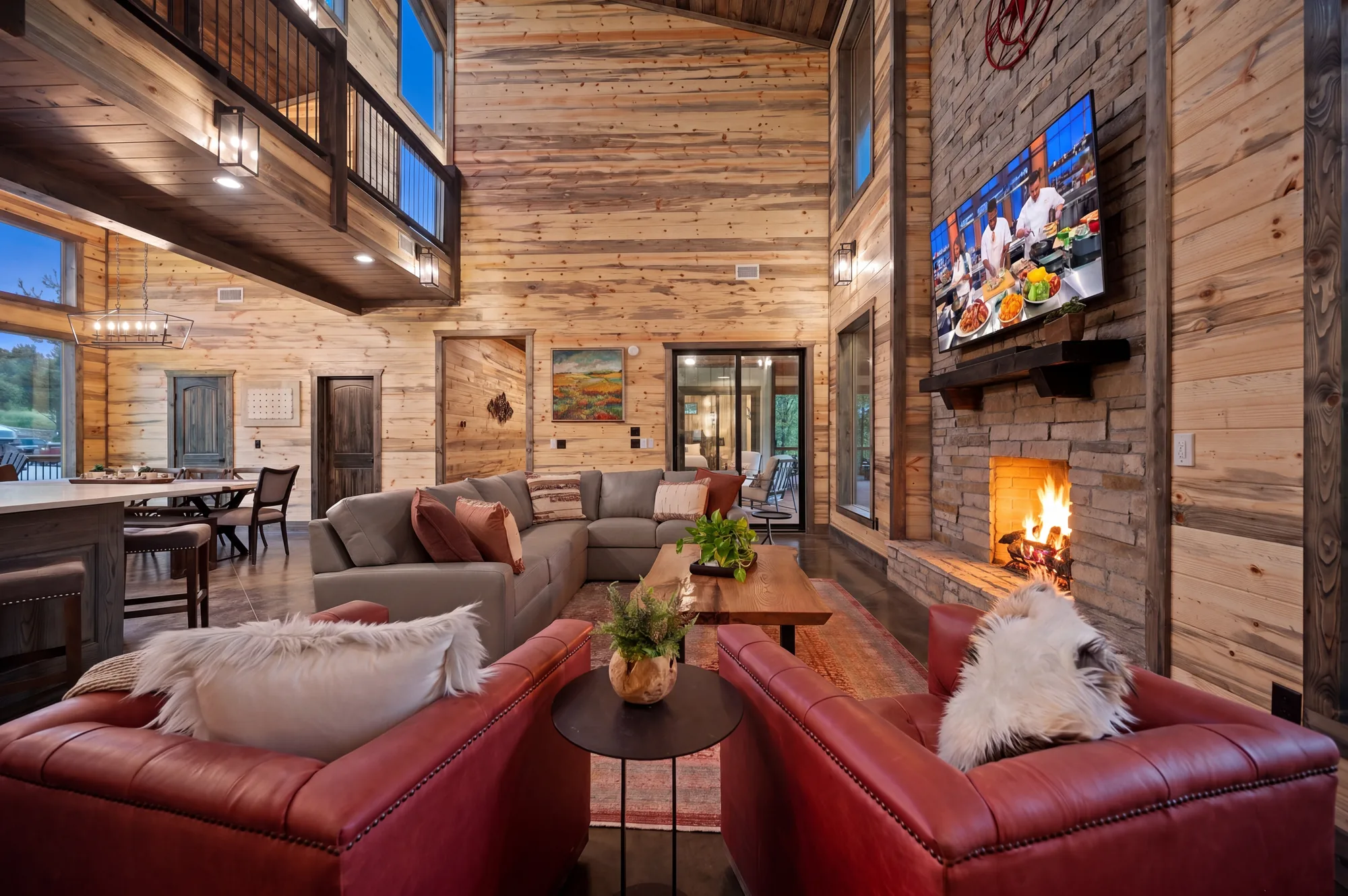 Living room with smart TV and gas fireplace at Dreams & Streams
