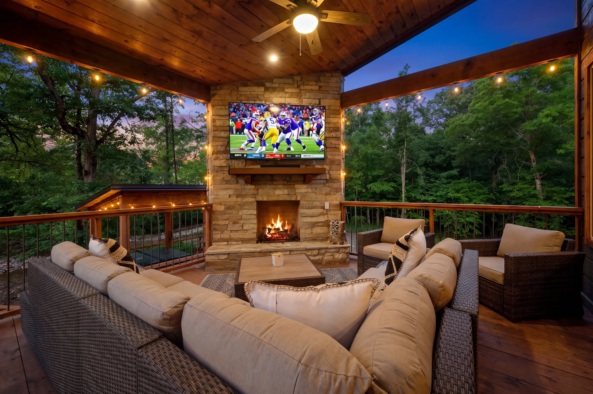 Outdoor fireplace seating area at Dreams & Streams