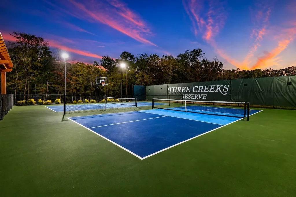 Lighted pickleball and basketball courts at Three Creeks Reserve, a shared resort amenity included at no extra cost.