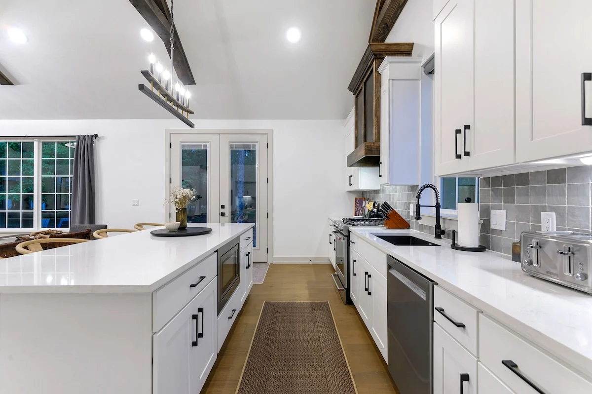Cook for the whole group in a fully equipped gourmet kitchen with a spacious island and premium stainless steel appliances.