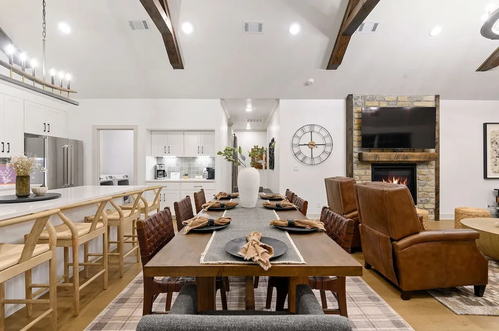 Open dining area between the kitchen and living room at Eleven:Eleven
