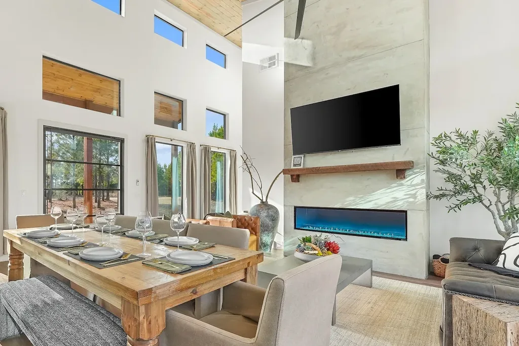 Set dining table beside the living-room fireplace