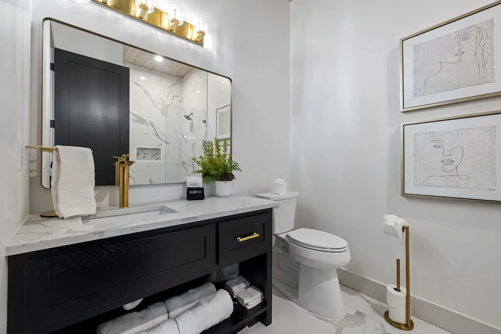 Full Bathroom 3 vanity, mirror, and toilet