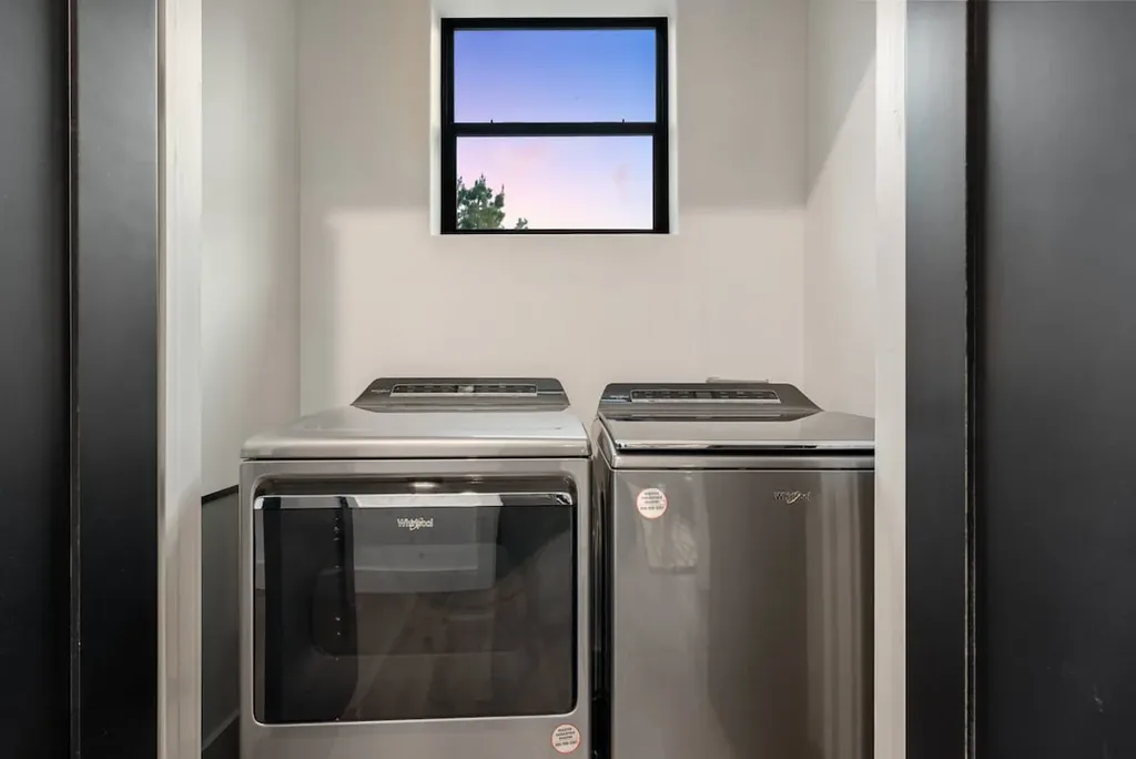 Laundry area with full-size washer and dryer